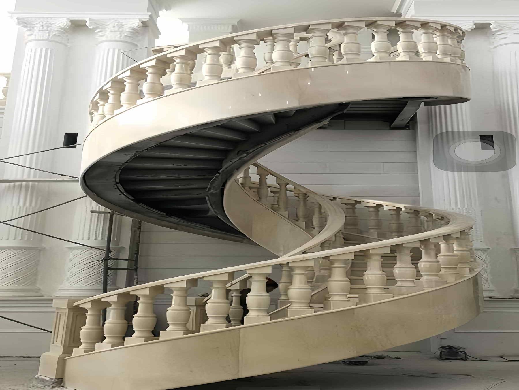 Escalera de caracol y trabajos de mármol con chorro de agua para proyectos del Hotel Kempinski
