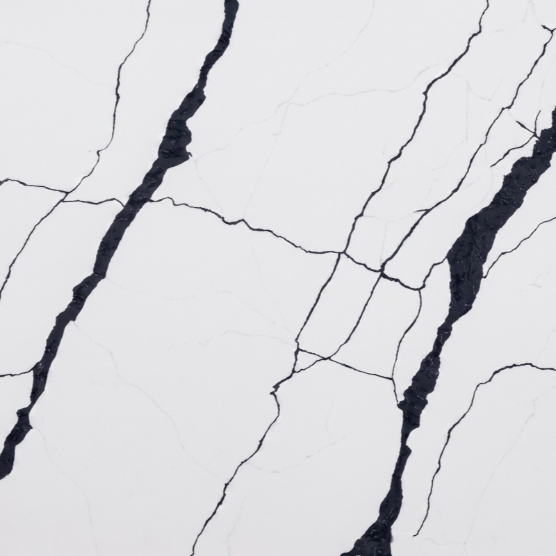 Full slab view of Steel Rift White Quartz with bold steel grey veins