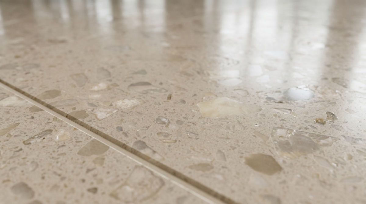 Large-area artificial marble flooring with consistent visual rhythm in a public interior
