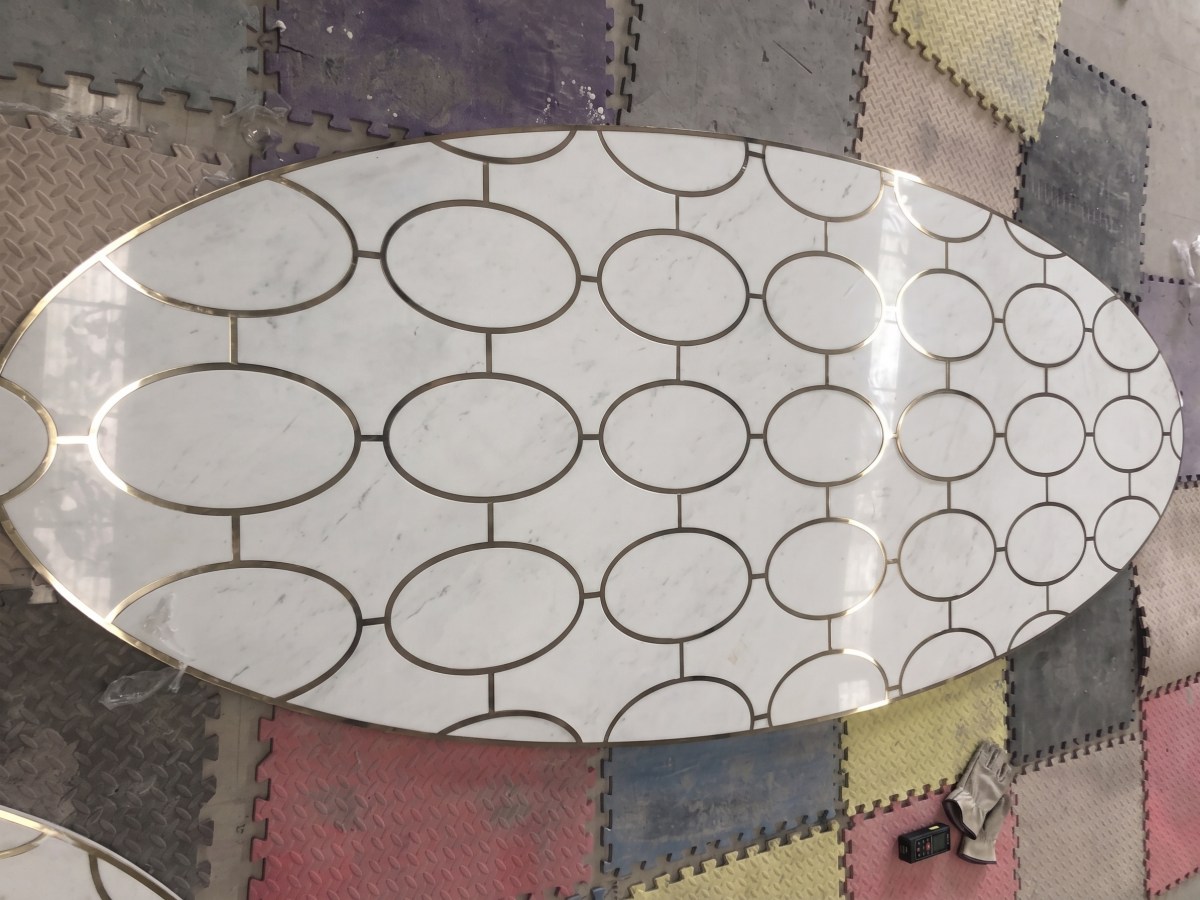 custom-white-marble-casino-floor-medallion-brass-inlay Aoli Stone custom white marble casino floor medallions with brass inlay during factory pre-assembly