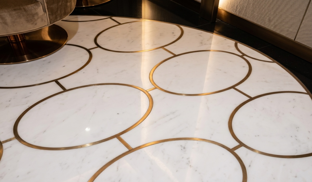 marble floor medallion with repeated brass inlay pattern marble floor medallion with repeated brass inlay pattern