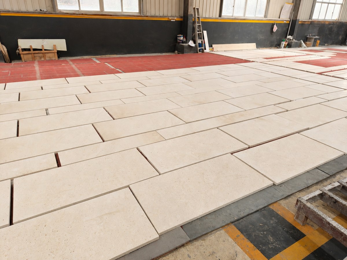 Cotswold Cream Limestone cut-to-size panels arranged for dry layout inspection before project delivery