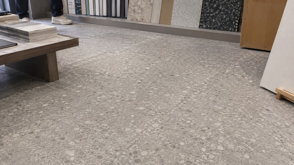 Cement terrazzo floor sample with mineral base and natural aggregate character