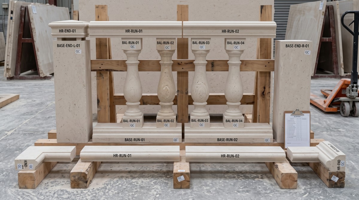Moonlight Beige Limestone handrail, balusters, base and end pieces arranged as a component system